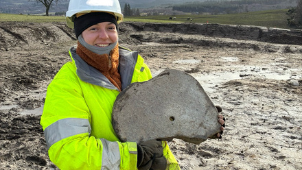 Jenny and Post Medieval Quern Stone in Scotland.jpeg
