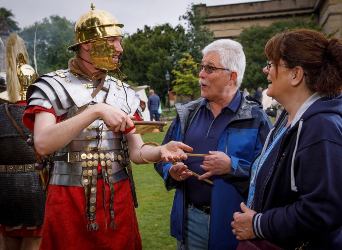 Roman Soldier talking to visitors at Eboracum Roman Festival