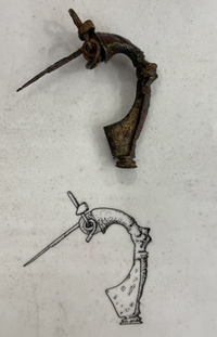Roman brooch top and illustration below using stippling