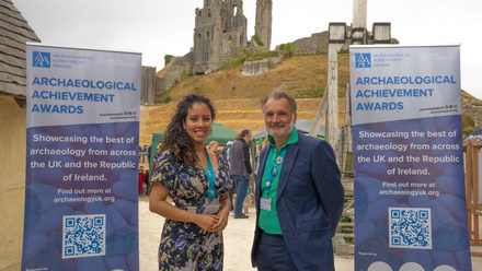 1 Jeannette Plummer Sires and Neil Redfern at Corfe Castle with AA Awards Banners small.jpg