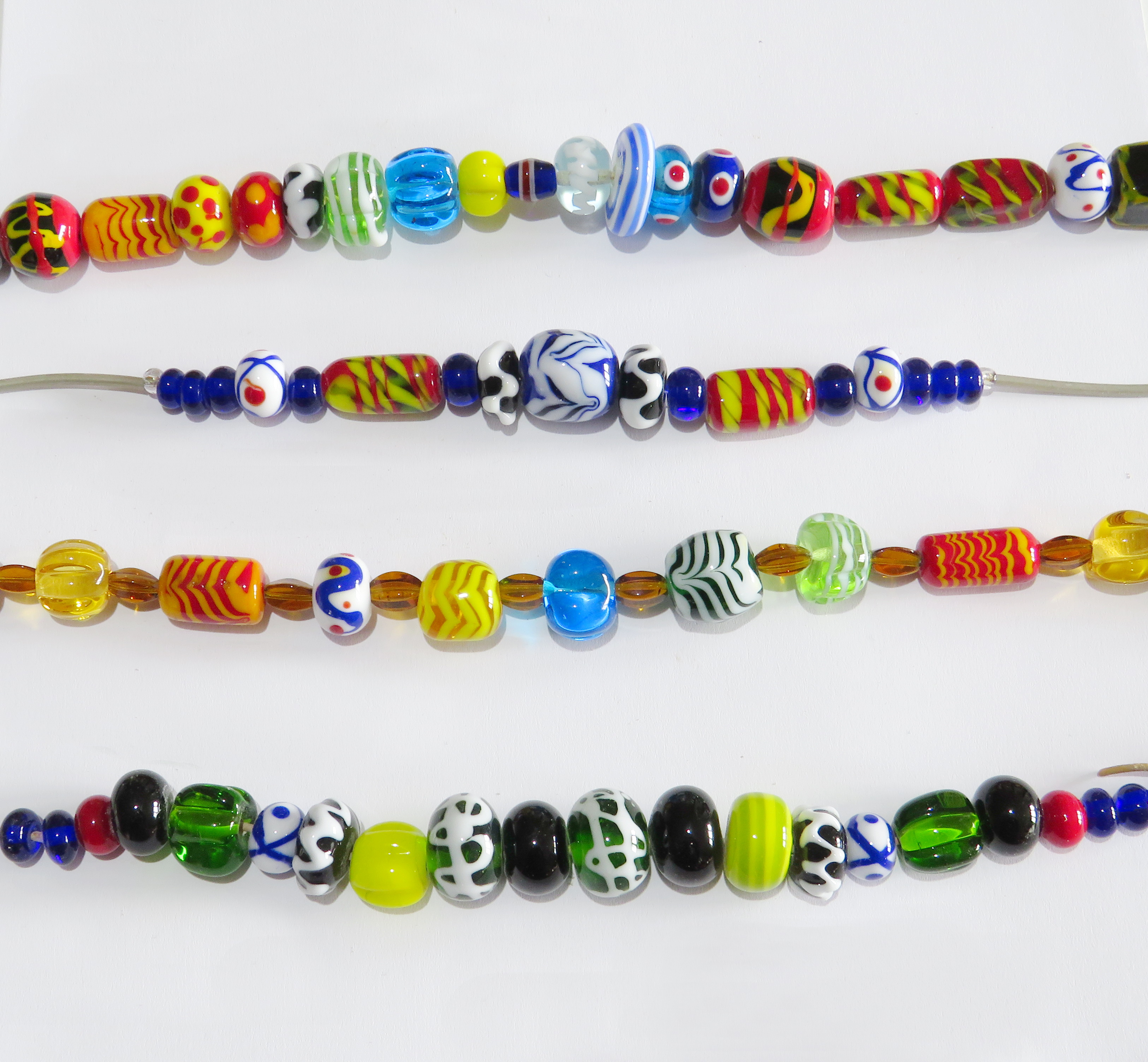 four rows of colourful beads